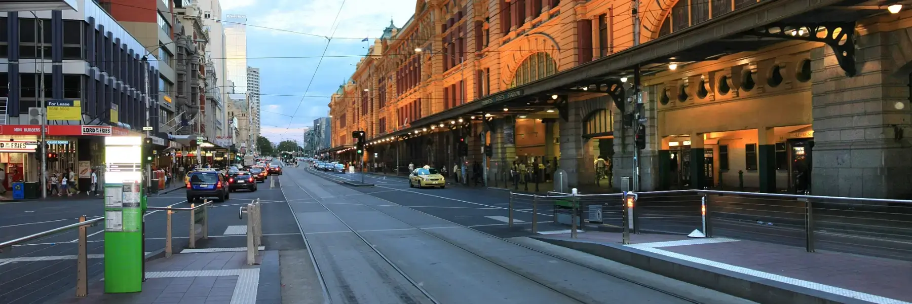 parked on Collins Street, Melbourne CBD at dusk 