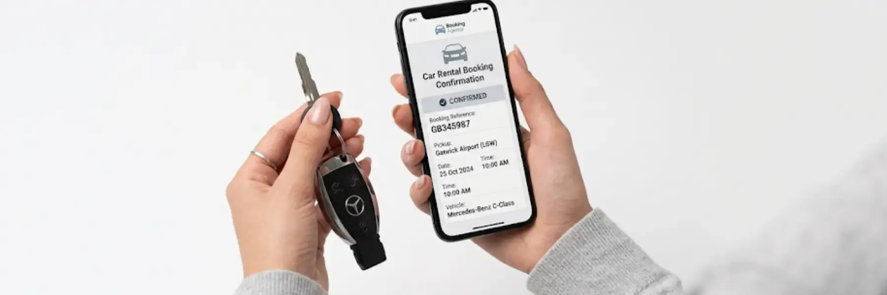 car key and phone with booking confirmation